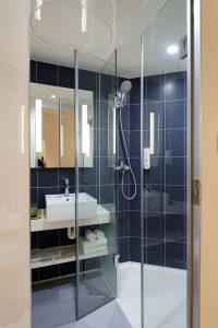 shower with lavatory area